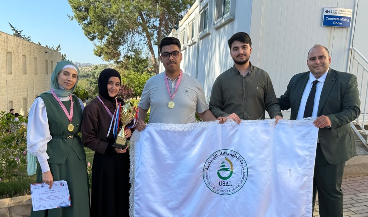 USAL University students celebrating after winning the Lebanon Debate Championship and qualifying for the international competition in Qatar.