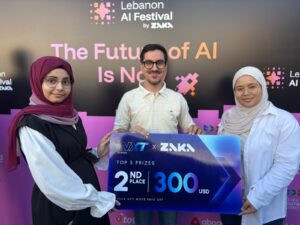 USAL graduate Fatima Fakih holding her 2nd-place award at the Lebanon AI Festival organized by Zaka AI.